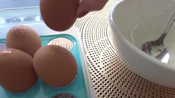 Female Hands Taking Cracking Egg Shells Falling Bowl Breaking Egg — Stock Video