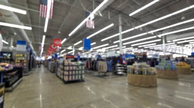 Süpermarket, minimarket, büyük perakendeciler ya da içerik oluşturma için Amerika 'daki bakkalların odaksız bulanık arka planı