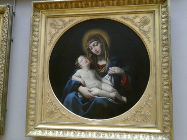 Nice photo frame inside Louvre museum of Mary and Jesus in Paris in France