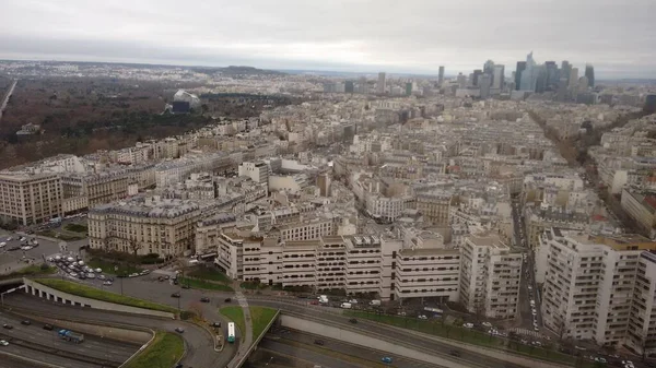 Beautiful view of city of Paris from the top with buildings and roads