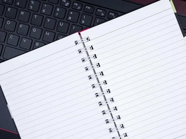 Blank notebook on laptop keyboard 10 — Stock Photo, Image