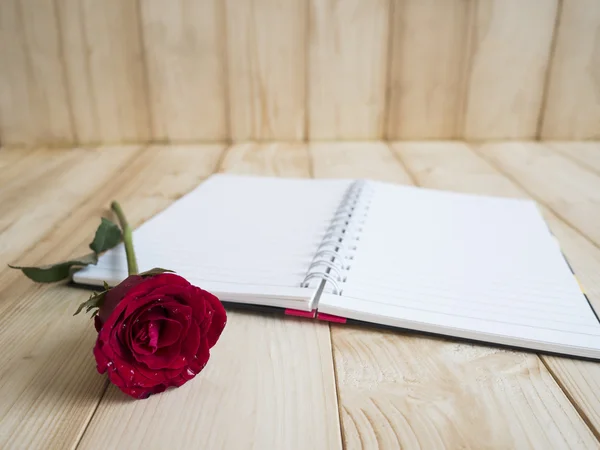 Red rose and notebook page 2 — Stock Photo, Image