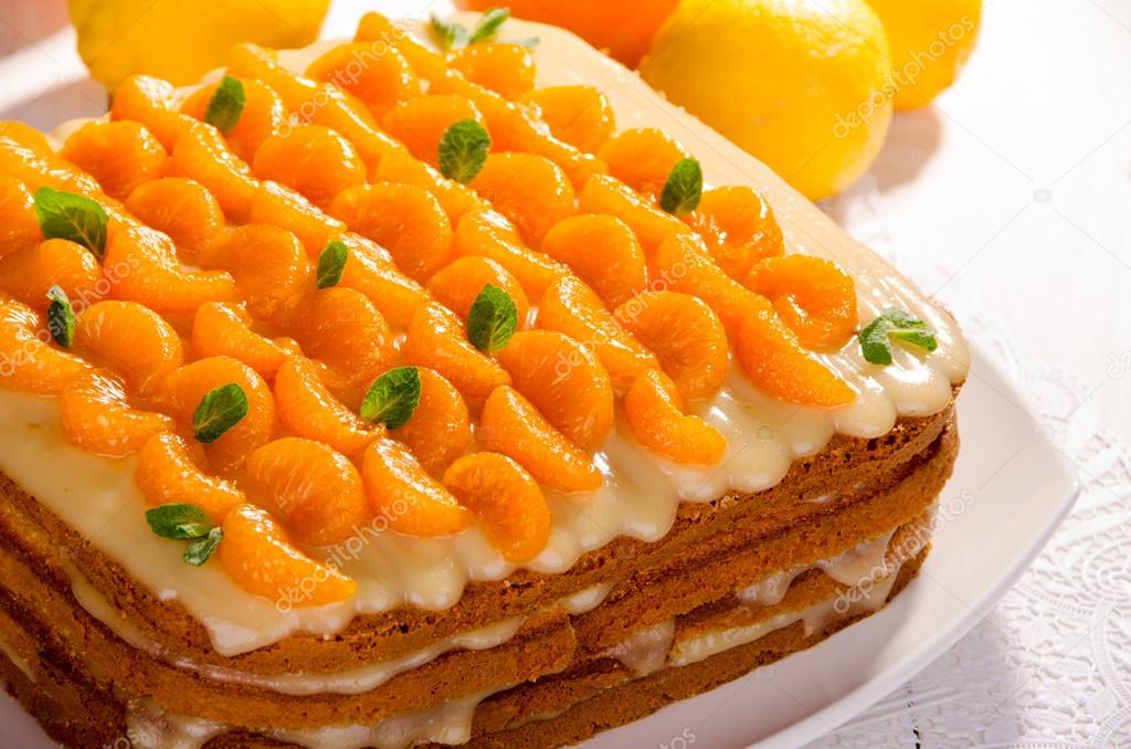 depositphotos_104863064-stock-photo-citrus-cake-decorated-with-mandarin.jpg