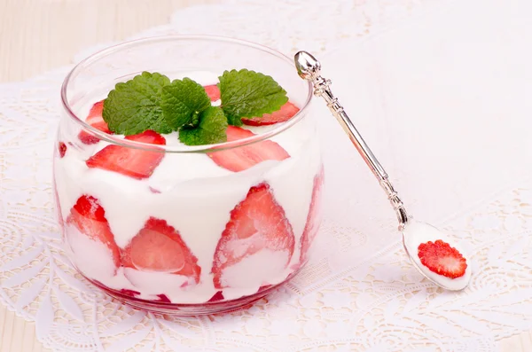 Strawberry dessert with spoon — Stock Photo, Image
