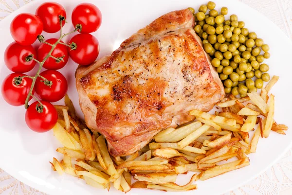 Roast pork with vegetables, top view — Stock Photo, Image