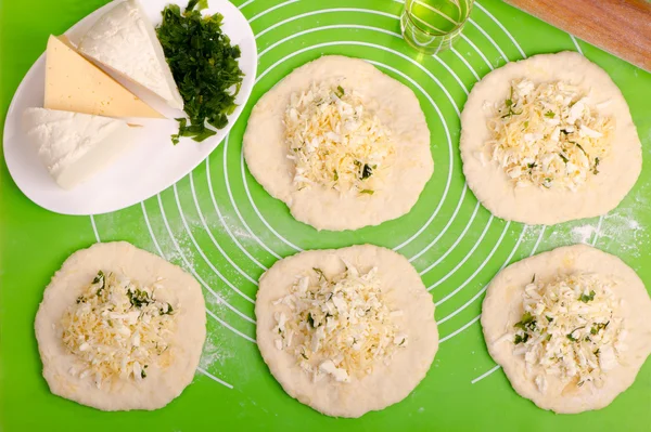 Flat cake with cheese stuffing — Stock Photo, Image