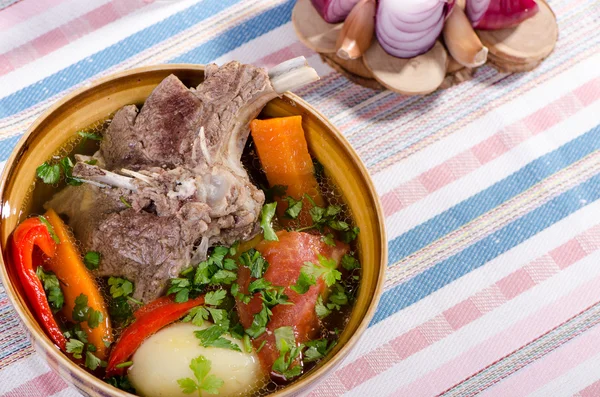 Soup shurpa - traditional oriental dish with lamb — Stock Image Soup shurpa - traditional oriental dish with lamb Stock Photo