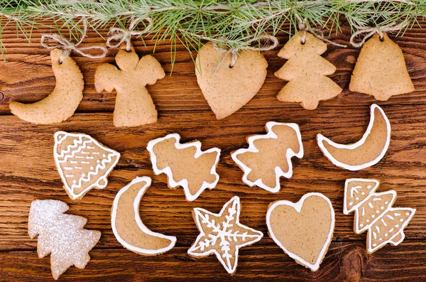 Gingerbread cookies on a wooden background — Stock Photo, Image