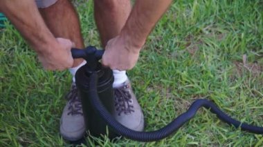 A man that is standing in the grass. High quality footage