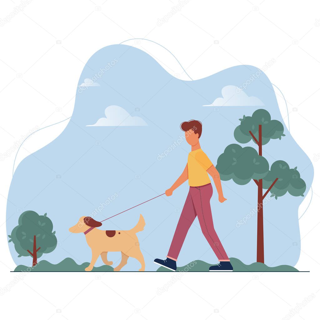 Young man with dog on leash walking in public city park. Boy spending time with pet in forest. Promenade with animal among trees.