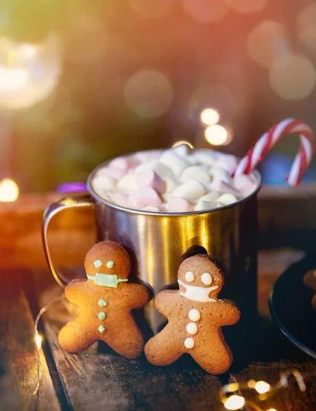 Christmas gingerbread cookies and mug of coffee on a tray