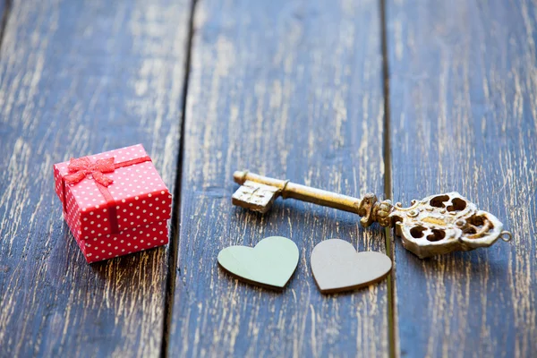 Gift box with heart shapes — Stock Photo, Image