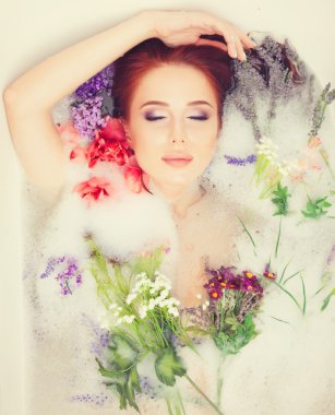 girl in the bathroom with flowers
