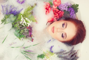 girl in the bathroom with flowers