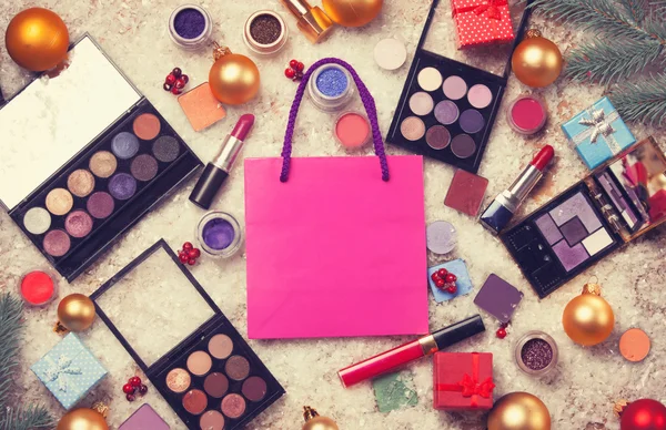 Pink bag and cosmetics 