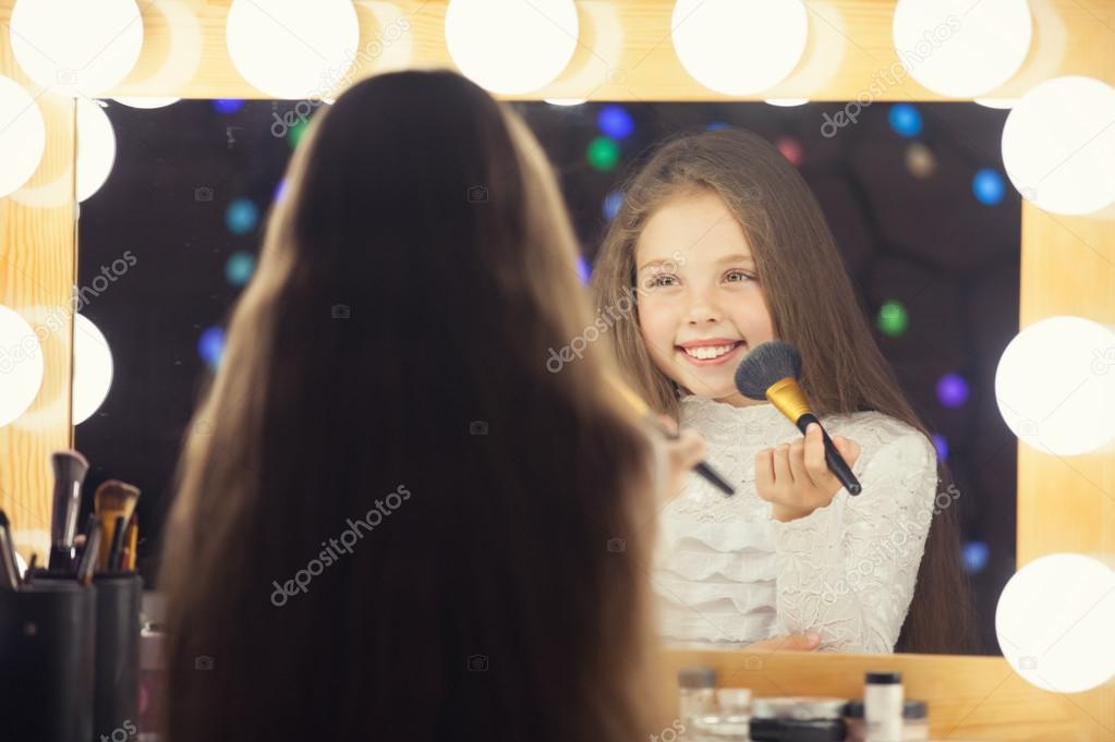 Young girl with brush 