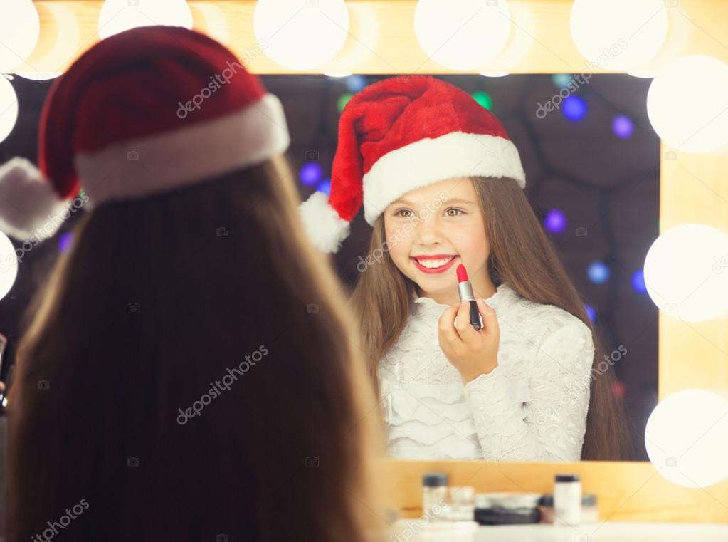 Girl in red Santas hat