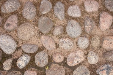 Asfalt döşeli taş kaldırım dokusu 