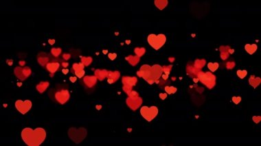 4K 3D, siyah arkaplanda merkezden akan, kusursuz, romantik, uçan kırmızı kalpler oluşturur. Romantik yıldönümü olayları için mükemmel bir döngü. Bitmeyen Hareket Sevgililer Günü Anneler Günü.
