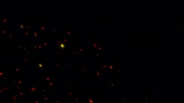 Soyut Ateşli Kıvılcımlar Yanar Parçacıklar Rastgele Uçar. 4K 3D, ProRes 4444 kullanılarak şeffaflıkla izole edilmiş Siyah üzerinde parlayan ateş parçacıkları oluşturur. Ateş Tozu Ekranı Kaplama Efekti.
