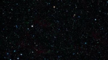 Siyah arkaplanda parlayan yıldızların 4K 3D kusursuz döngüsü. Galaksi gökyüzü parlayan ışık ile uzay animasyonunda grafiksel hareket örtüsü etkisi döngüsü. Galaksi uzayı keşfi ve dönüşü.