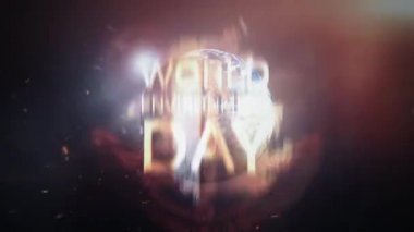 Dünya Çevre Günü sinematik döngü kavramı. 4K 3D görüntüleme Dünya Çevre Günü altın metin başlığı giriş enerji patlaması etkisi, dünya küresi dönüş, toz ve ışık patlaması.