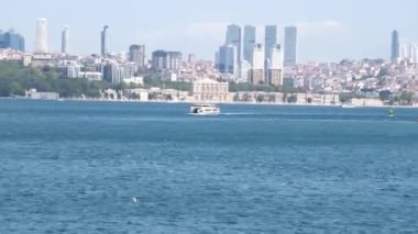 Boğaz, Bakire Kulesi, el kameralı feribot ve kargo, zaman ayarlı.