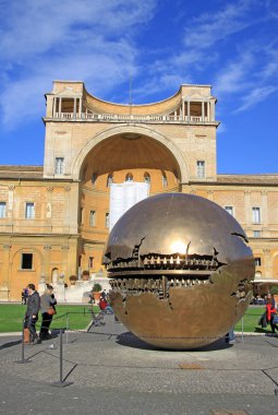 VATICAN, ROME, ITALY - DECEMBER 20, 2012: Sphere within sphere sculpture in Courtyard of the Pinecone at Vatican Museums