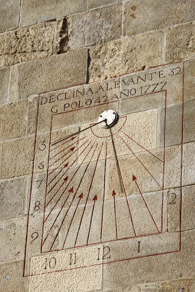 BARCELONA, SPAIN - DECEMBER 14, 2011: Sundial on a wall in Castle of Montjuic in Barcelona, Spain — Stock Photo, Image