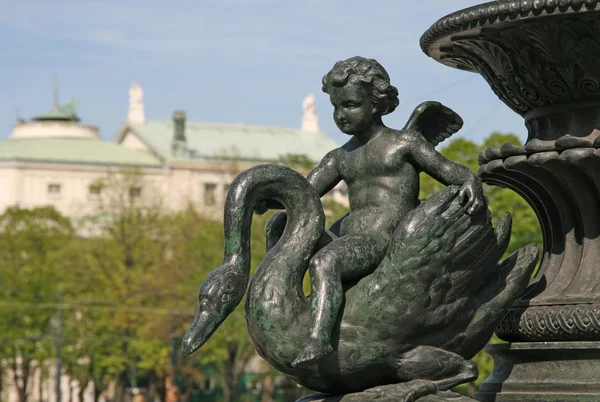 Statue of Cupid on a swan near Austrian Parliament Building, Vienna, Austria — ストック写真