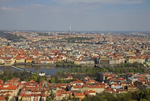 PRAGUE, CZECH REPUBLIC - APRIL 24, 2013: The aerial view of Prague City from Petrin Hill. Prague, Czech Republic — Stockfoto