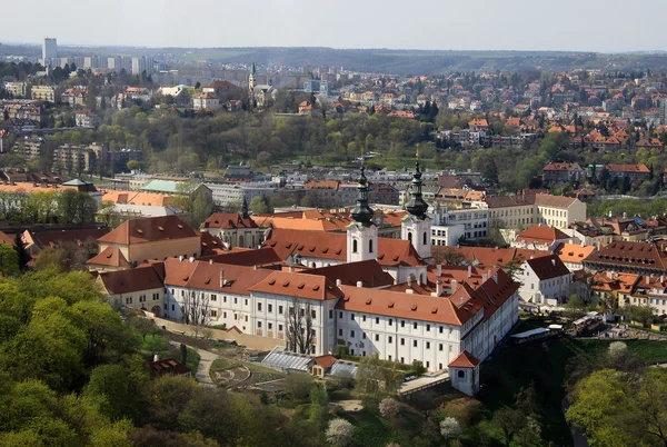 PRAGUE, CZECH REPUBLIC - APRIL 24, 2013: The aerial view of Strahov Monastery from Petrin Hill. Prague, Czech Republic — Stock Photo, Image