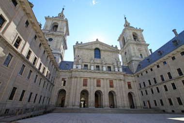 SAN LORENZO DE EL ESCORIAL, SPAIN - AUGUST 25, 2012: Inner courtyard Patio de los Reyes in El Escorial, a historical residence of the King of Spai