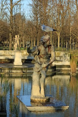 PARIS, FRANCE -18 DECEMBER 2011: Hippomene statue in Tuileries Garden, Paris, France