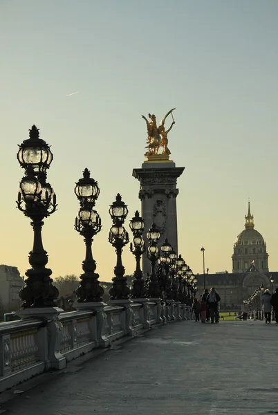 PARIS, FRANCE -18 DECEMBER 2011: Pont Alexandre lll on sunset, Paris, France — Stock Photo, Image