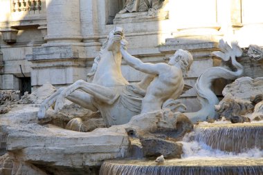 ROME, ITALY - DECEMBER 20, 2012:  Triton and hippocampus statue, part of Trevi fountain in Rome, Italy