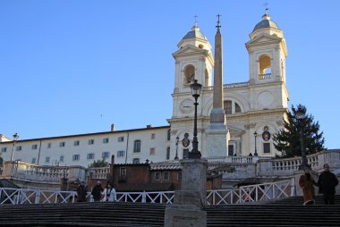 ROME, ITALY - DECEMBER 20, 2012: The church of the Santissima Trinita dei Monti above the Spanish Steps in Rome, Italy
