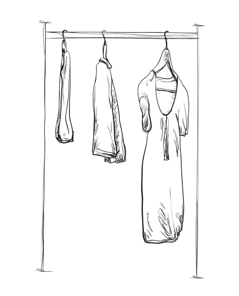 Kleding op hangers. — Stockvector