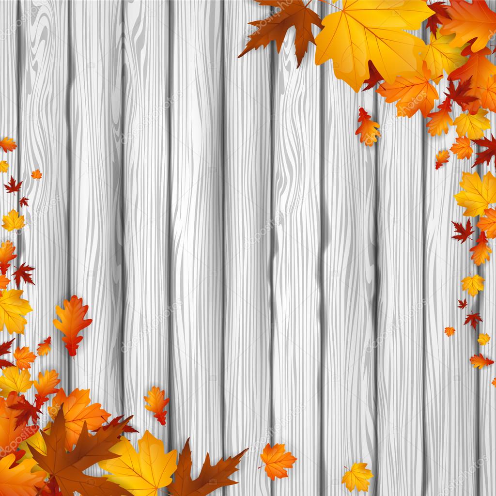 Wooden board and autumn leaves.