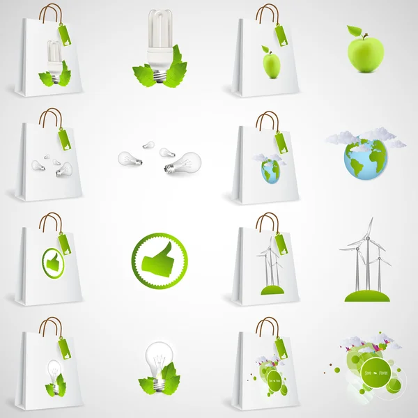 Bolsas de papel con iconos ecológicos verdes — Vector de stock