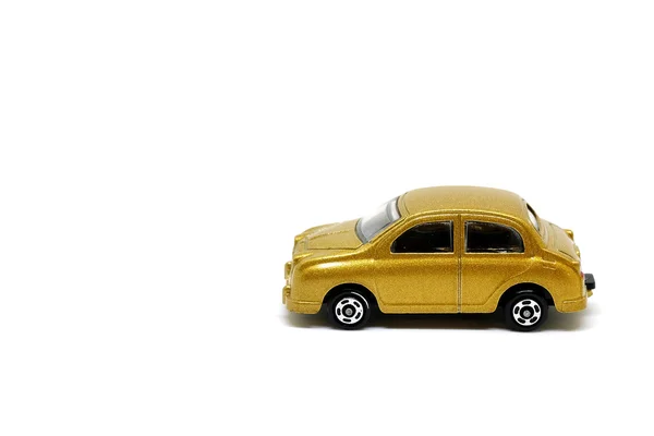 Carros de brinquedo dourado — Fotografia de Stock