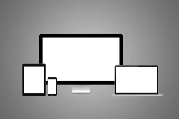 Смартфон, планшет, ноутбук и монитор компьютера — стоковое фото