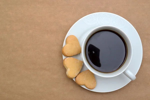 Tasse à café et biscuits en forme de cœur Photo De Stock