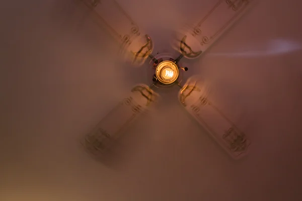 Retro fan with Edison's lamp — Stock Photo, Image