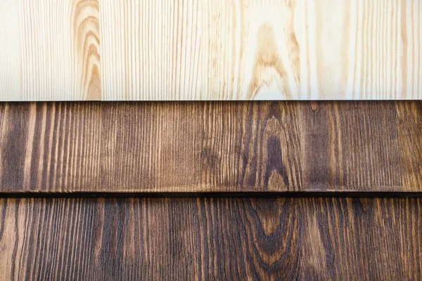 Horizontal boards of wood in three colors