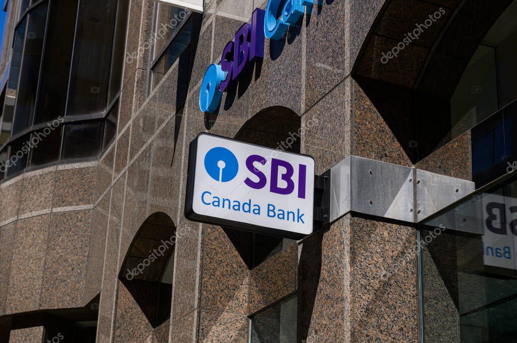 Toronto, ON, Canada - September 19, 2025: A close-up view shows the name and logo for the SBI Canada Bank branch on the outside of a building in the financial district.