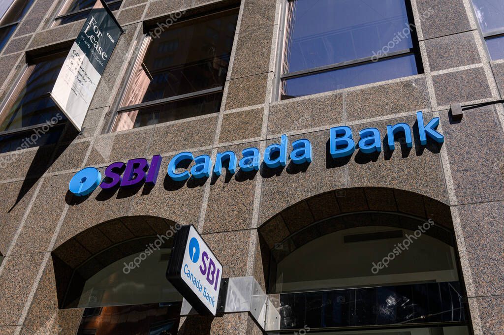 Toronto, ON, Canada - September 19, 2025: A close-up view shows the name and logo for the SBI Canada Bank branch on the outside of a building in the financial district.