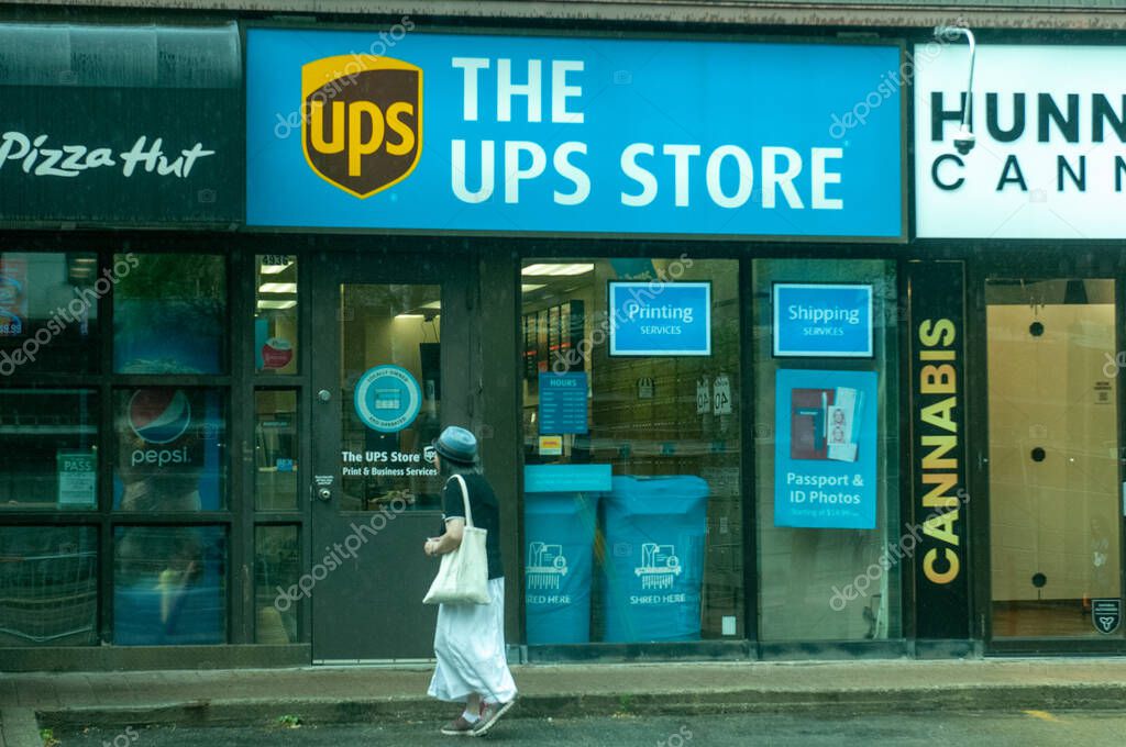 Toronto, ON, Canada - March 30, 2025: View at the UPS store sign in Toronto