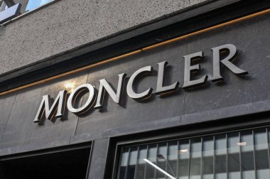 Toronto, ON, Canada - September 18, 2025: A modern Moncler sign graces the stylish storefront with large windows.