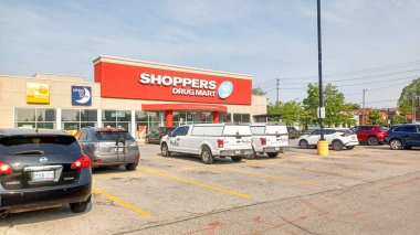 Toronto, ON, Canada - March 3, 2025: The logo and brand sign of Shoppers Drug Mart Store in Toronto, Canada.